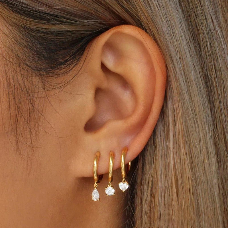 Aretes Encanto Waterproof - Joya en acero inoxidable enchapado en oro 18k - D'Merys
