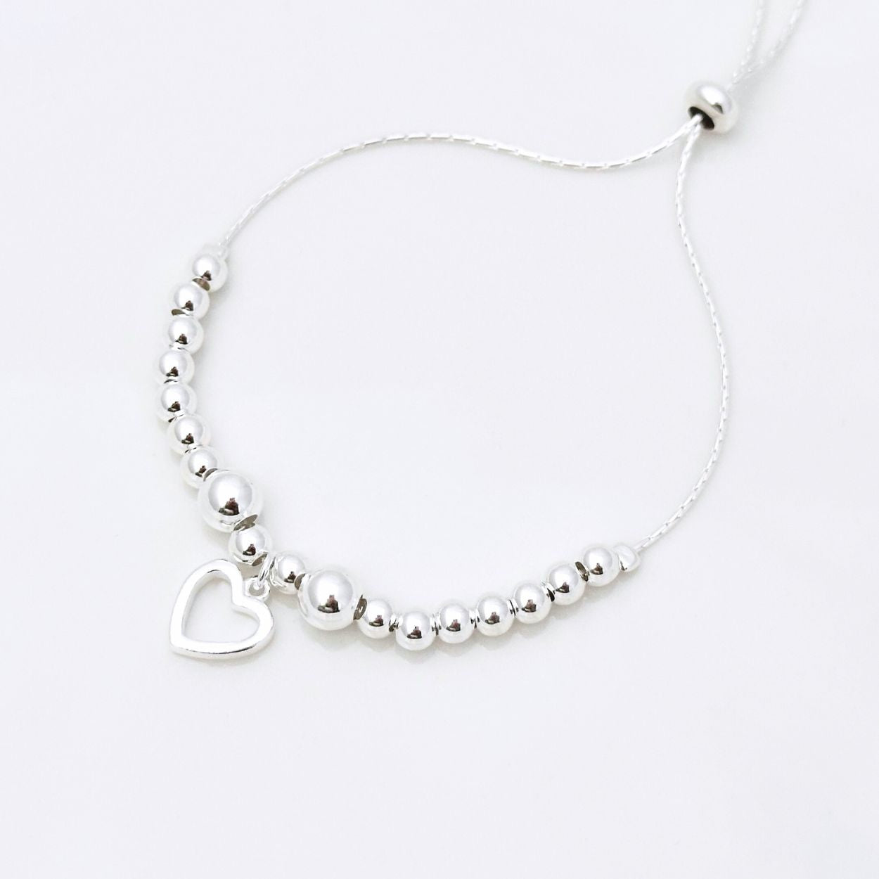 Pulsera_Corazon_Calado_Ajustable_Plata_925_1.jpg